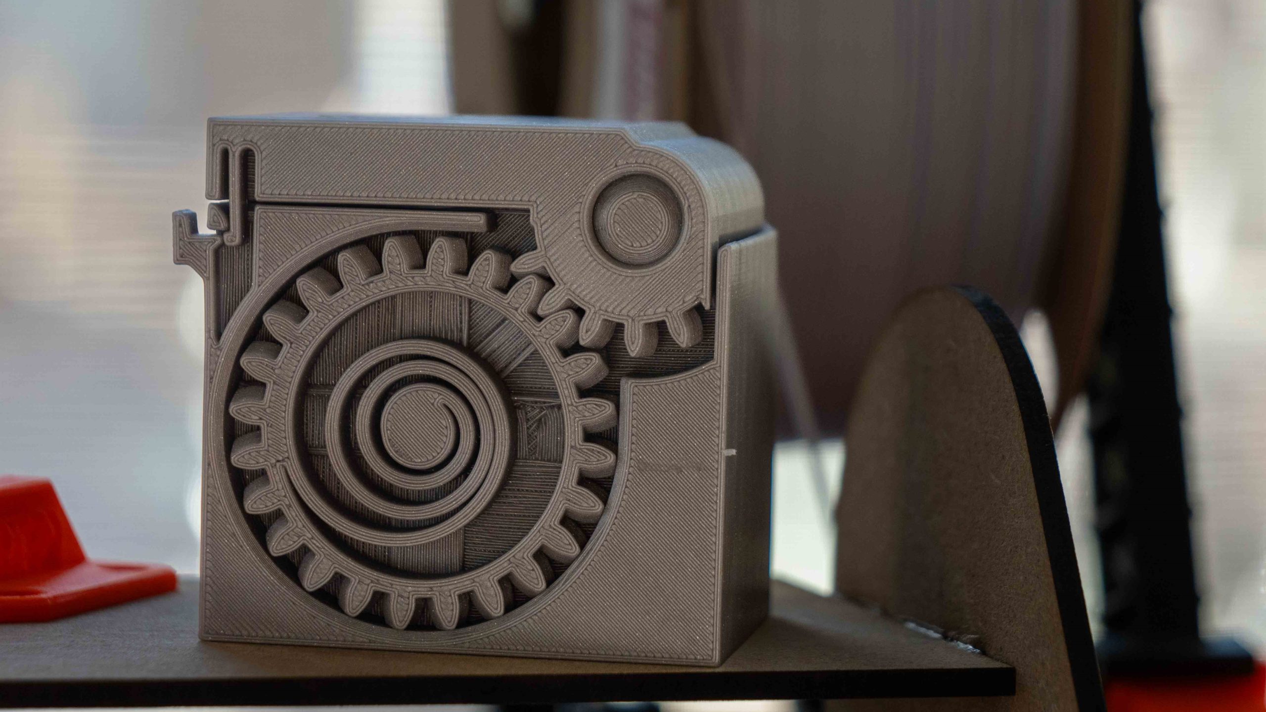 Mécanisme d'engrenages imprimé avec une imprimante 3D.